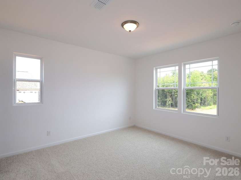 249 Amber Glen Drive, Locust, NC 28097.  MLS# CAR4416144, YatesRealty ID 46853. Secondary bedroom