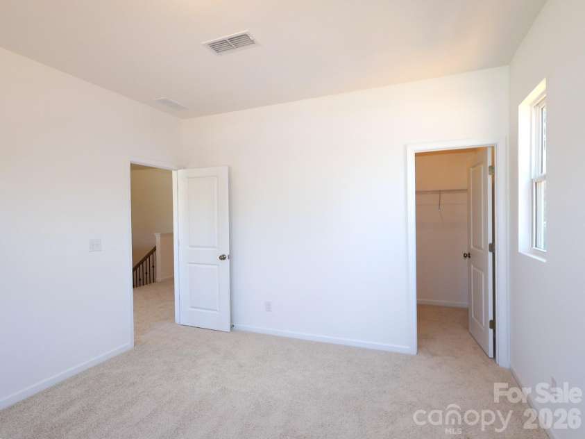 249 Amber Glen Drive, Locust, NC 28097.  MLS# CAR4416144, YatesRealty ID 46853. Secondary bedroom