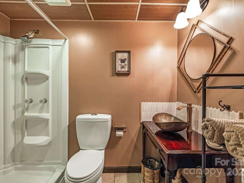 117 Holcombe Branch Road, Weaverville, NC 28787.  MLS# CAR4317164, YatesRealty ID 46857. Basement apartment bathroom