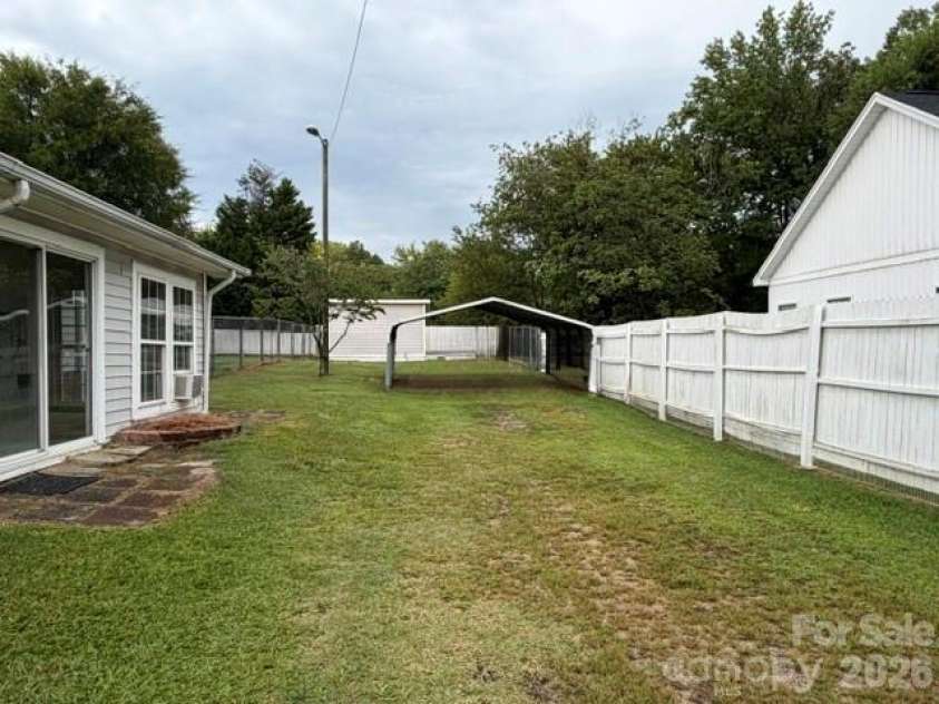 506 Grace Avenue, Kannapolis, NC 28083.  MLS# CAR4416860, YatesRealty ID 46859. Covered carport