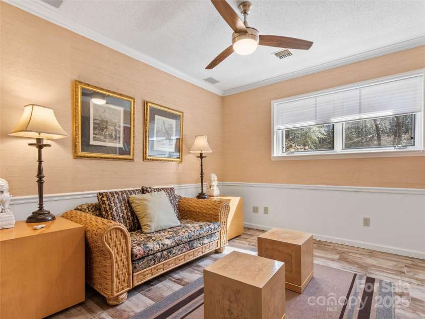 33 Fairway Loop, Burnsville, NC 28714.  MLS# CAR4228138, YatesRealty ID 4686. Den downstairs