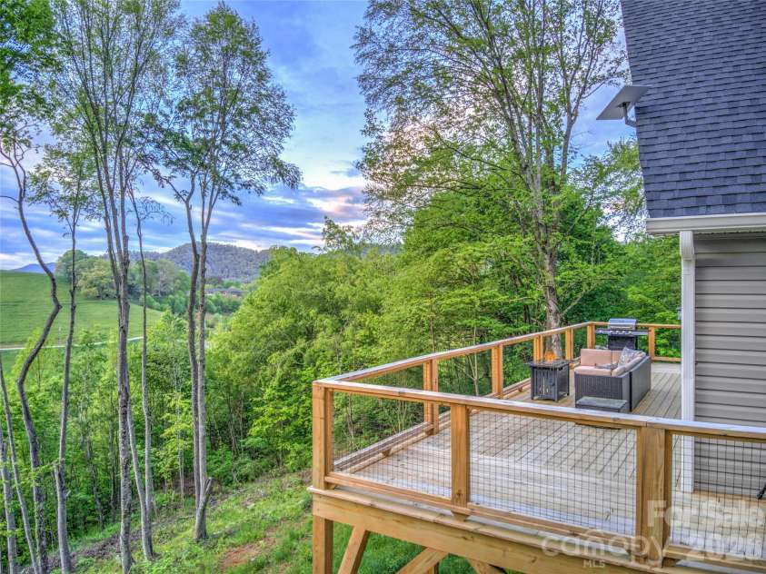 145 Banjo Lane, Waynesville, NC 28785.  MLS# CAR4413174, YatesRealty ID 46861. Deck + views