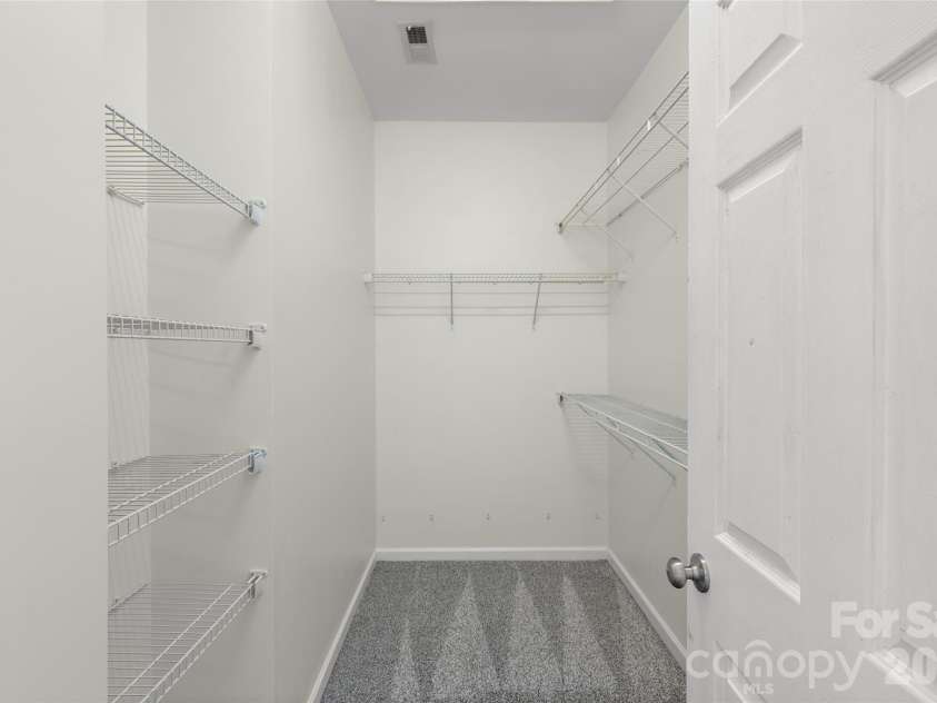7600 Turley Ridge Lane, Charlotte, NC 28273.  MLS# CAR4413385, YatesRealty ID 46876. Primary walk-in closet.