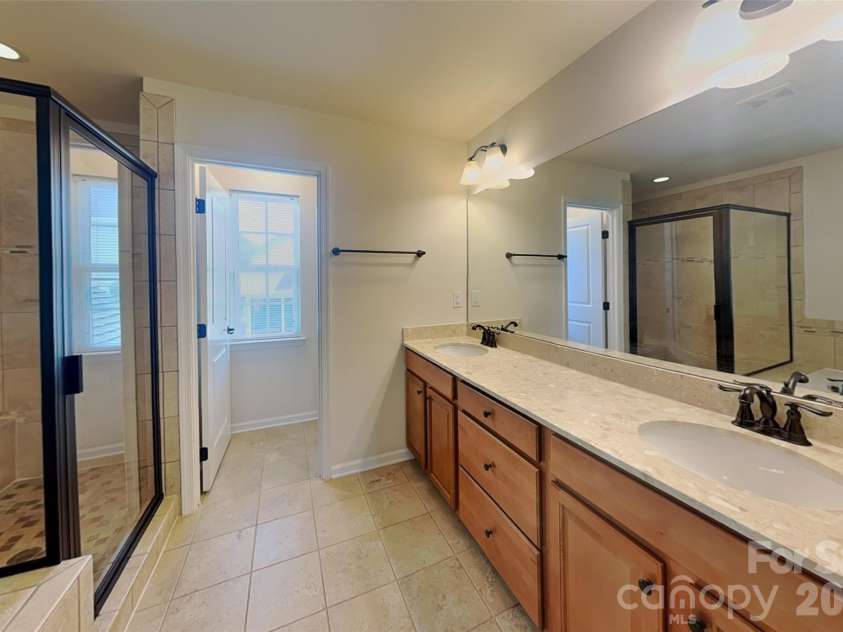 8133 Early Bird Way, Mint Hill, NC 28227.  MLS# CAR4418179, YatesRealty ID 46877. Primary bathroom