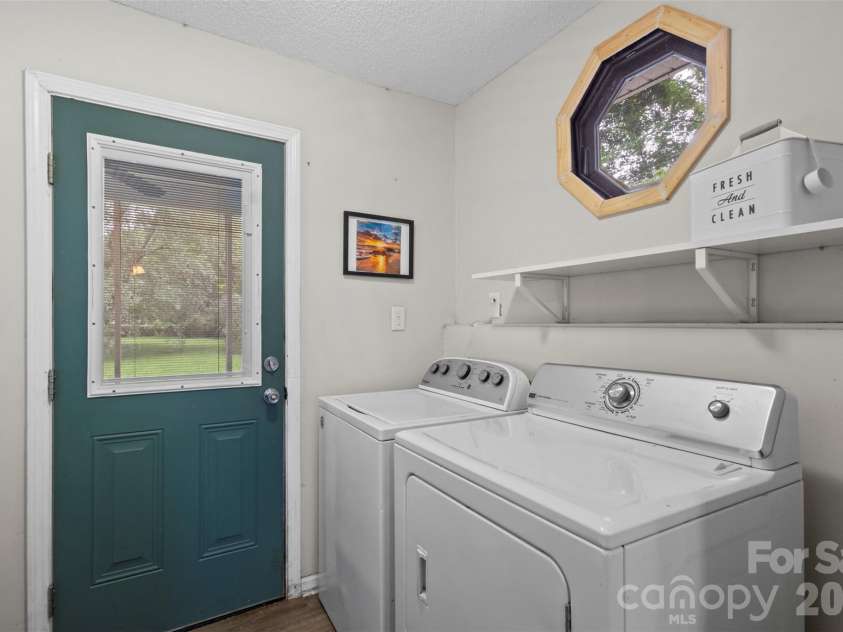 205 Phifer Street, Marshville, NC 28103.  MLS# CAR4417696, YatesRealty ID 46883. Dedicated laundry room