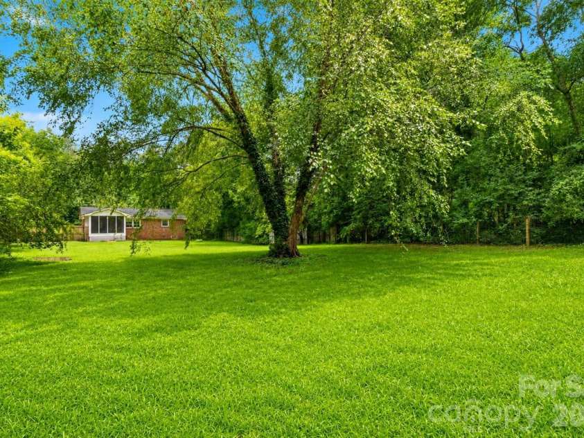 205 Phifer Street, Marshville, NC 28103.  MLS# CAR4417696, YatesRealty ID 46883. Huge fully fenced in backyard