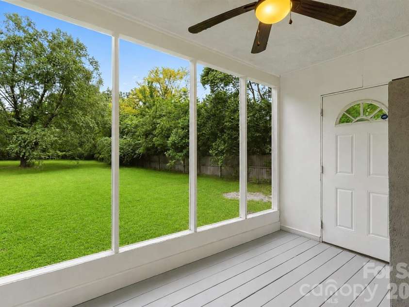 205 Phifer Street, Marshville, NC 28103.  MLS# CAR4417696, YatesRealty ID 46883. Screened in patio