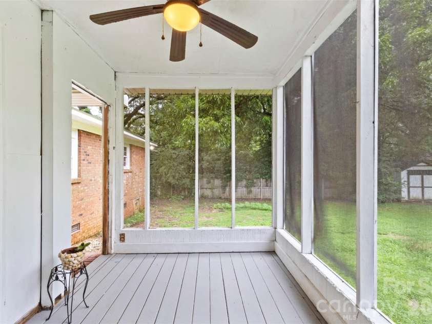 205 Phifer Street, Marshville, NC 28103.  MLS# CAR4417696, YatesRealty ID 46883. Screened in patio