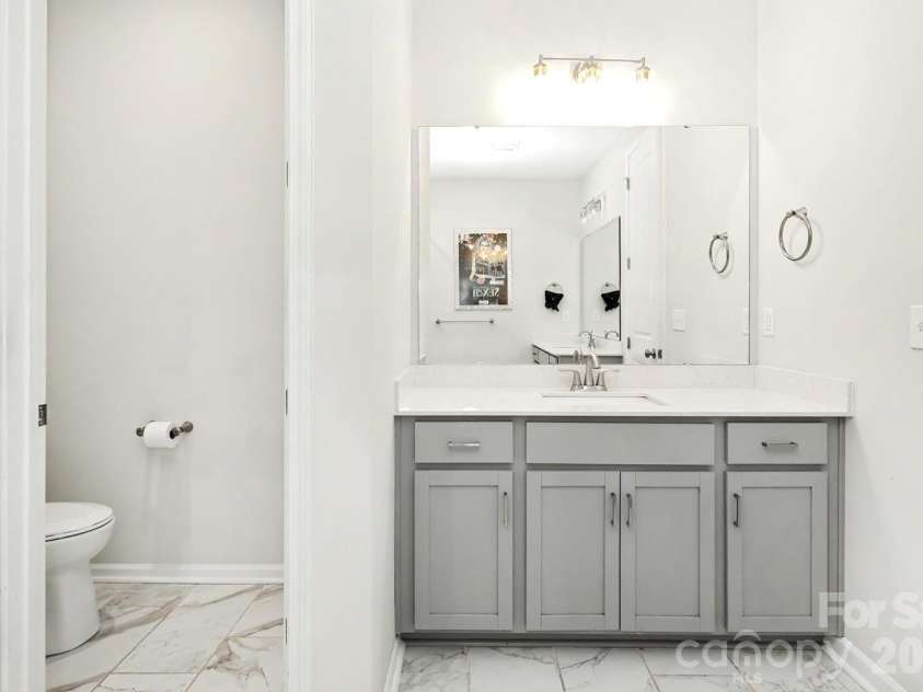 816 Redd Alley, Charlotte, NC 28217.  MLS# CAR4415143, YatesRealty ID 46885. Primary bathroom featuring dual vanities