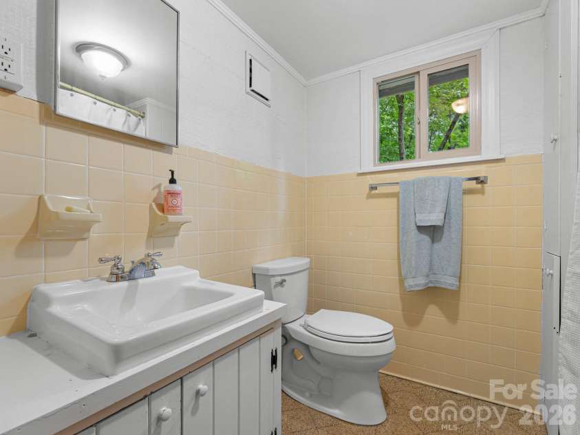 12 E Park Drive, Tryon, NC 28782.  MLS# CAR4415463, YatesRealty ID 46887. 