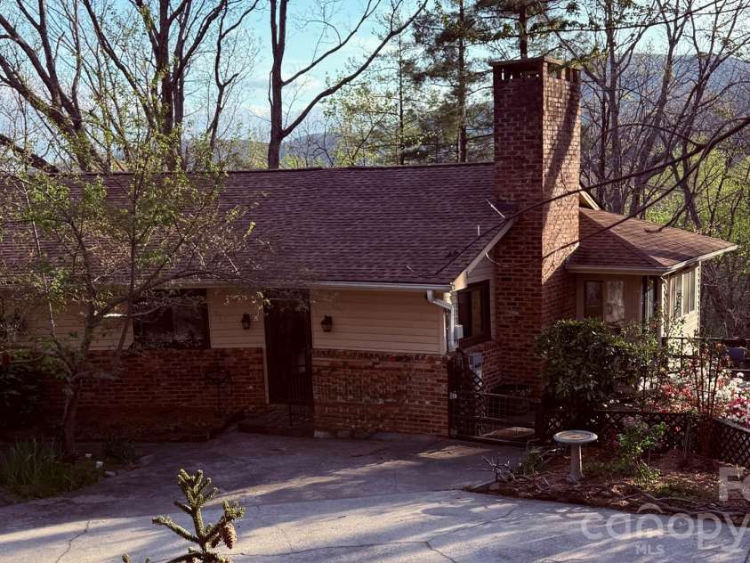 12 E Park Drive, Tryon, NC 28782.  MLS# CAR4415463, YatesRealty ID 46887. 