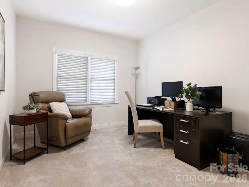 3228 Twelve Oaks Place, Charlotte, NC 28270.  MLS# CAR4337681, YatesRealty ID 4689. Downstairs Bedroom currently used as office