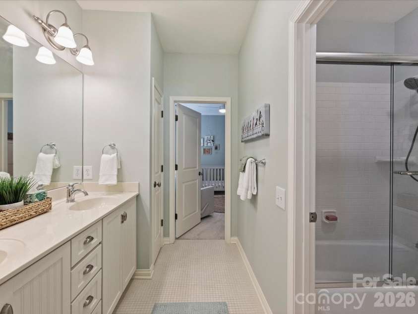8843 Heydon Hall Circle, Charlotte, NC 28210.  MLS# CAR4416774, YatesRealty ID 46894. Jack & Jill Bath 1