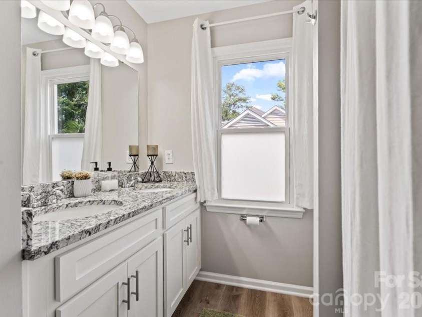 4519 Crownvista Drive, Charlotte, NC 28269.  MLS# CAR4410670, YatesRealty ID 46896. Upper Bathroom