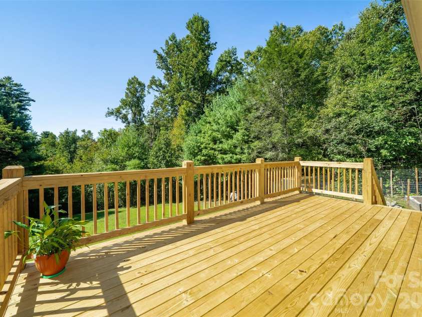 151 Willard Lane, Hendersonville, NC 28792.  MLS# CAR4281738, YatesRealty ID 4690. Beautiful large back yard