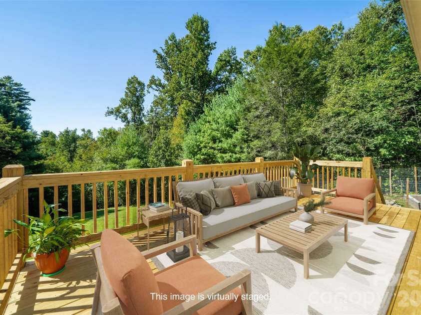 151 Willard Lane, Hendersonville, NC 28792.  MLS# CAR4281738, YatesRealty ID 4690. Brand new permitted back deck - virtually staged. 