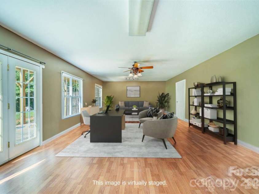151 Willard Lane, Hendersonville, NC 28792.  MLS# CAR4281738, YatesRealty ID 4690. Half finished basement, virtually staged. 