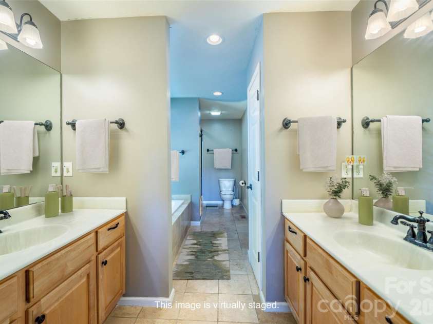 151 Willard Lane, Hendersonville, NC 28792.  MLS# CAR4281738, YatesRealty ID 4690. Primary bathroom ensuite - virtually staged