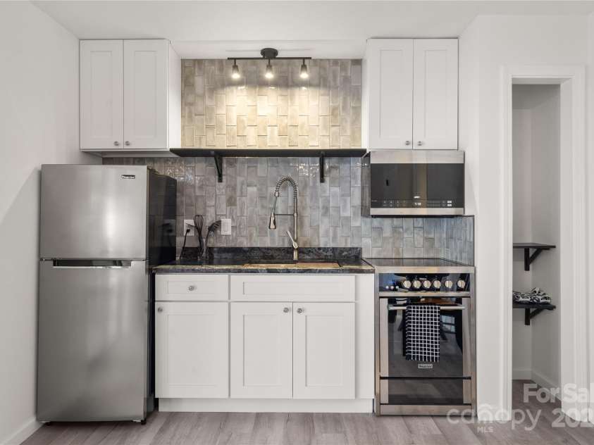 158 Blackberry Lane, Maggie Valley, NC 28751.  MLS# CAR4242897, YatesRealty ID 4690. Lower Level Kitchenette Closer View