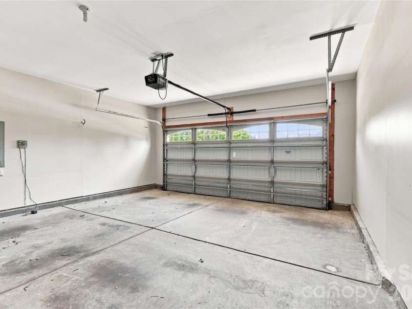 593 Harrison Drive, Concord, NC 28027.  MLS# CAR4413836, YatesRealty ID 46904. 2-Car finished garage