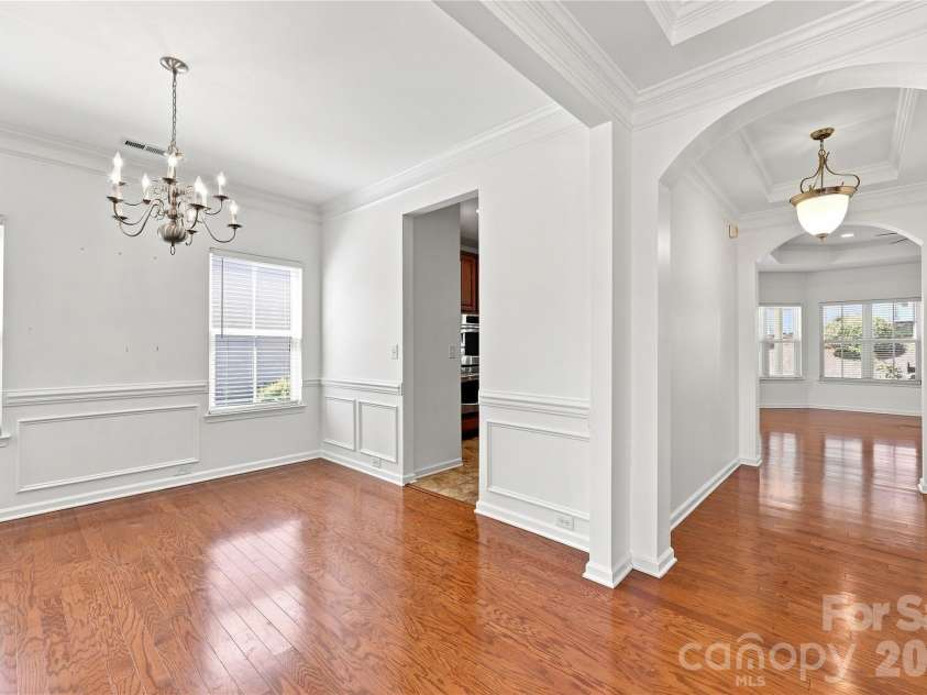 593 Harrison Drive, Concord, NC 28027.  MLS# CAR4413836, YatesRealty ID 46904. Formal dining room leading to kitchen