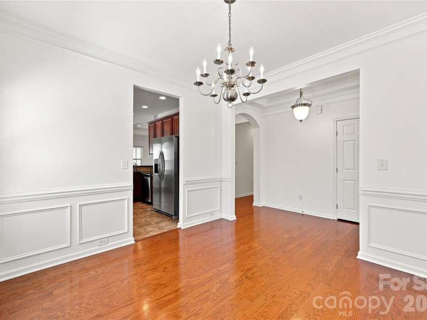 593 Harrison Drive, Concord, NC 28027.  MLS# CAR4413836, YatesRealty ID 46904. Formal dining room leading to the kitchen