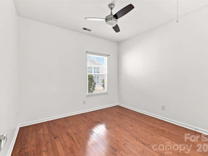 593 Harrison Drive, Concord, NC 28027.  MLS# CAR4413836, YatesRealty ID 46904. Second bedroom with ceiling fan