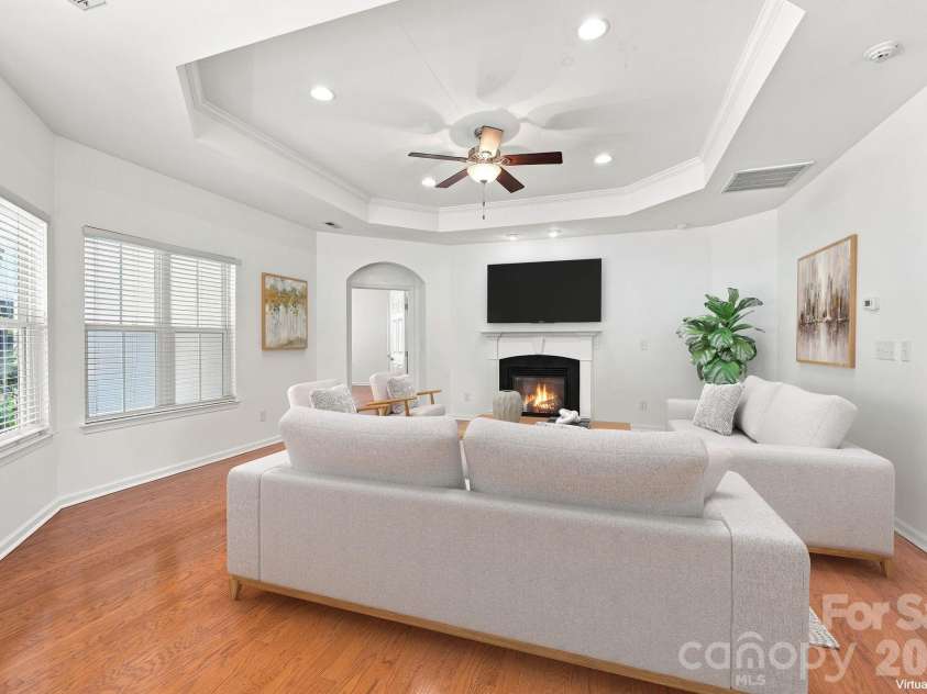 593 Harrison Drive, Concord, NC 28027.  MLS# CAR4413836, YatesRealty ID 46904. Spacious family room virtually staged