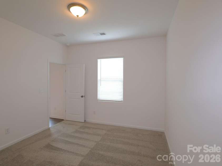 1521 Kate Cecil Way, York, SC 29745.  MLS# CAR4418457, YatesRealty ID 46906. First floor secondary bedroom