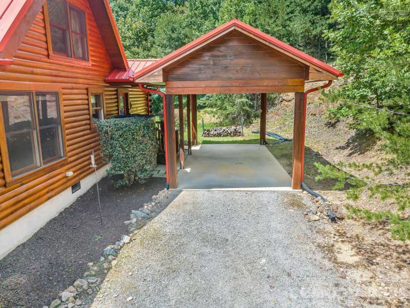 175 Big Rock Road, Bostic, NC 28018.  MLS# CAR4416989, YatesRealty ID 46907. Covered rear entry provides convenient access directly into the laundry/mudroom and kitchen, offering a practical and protected everyday entrance to the home.
