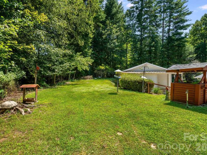 225 Arbor Lane, Hendersonville, NC 28791.  MLS# CAR4418437, YatesRealty ID 46913. Spacious and Private Back Yard