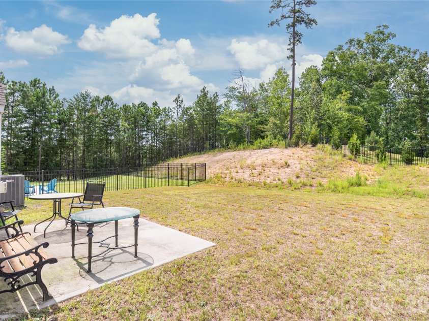 15308 Lake Ridge Road, Charlotte, NC 28278.  MLS# CAR4402264, YatesRealty ID 46930. Back patio overlooking the large backyard