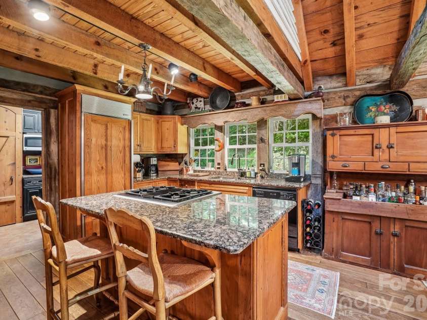311 Wonderly Lane, Mars Hill, NC 28754.  MLS# CAR4418288, YatesRealty ID 46935. Island W/ Granite Counters