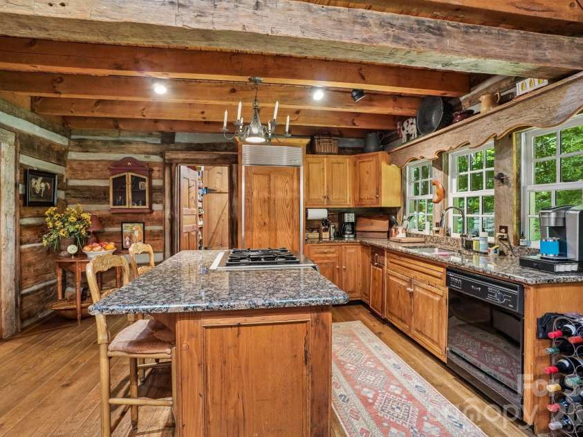 311 Wonderly Lane, Mars Hill, NC 28754.  MLS# CAR4418288, YatesRealty ID 46935. Island W/ Granite Counters