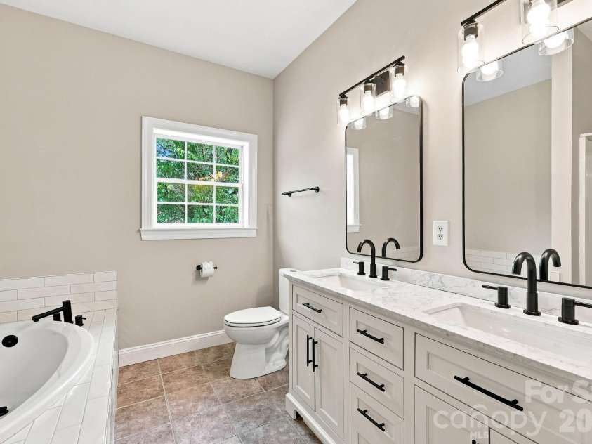 1395 Ebenezer Road, China Grove, NC 28023.  MLS# CAR4418139, YatesRealty ID 46945. Primary bathroom