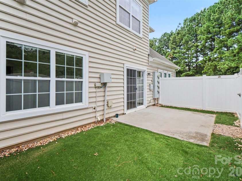 15109 Jade Street, Charlotte, NC 28277.  MLS# CAR4392614, YatesRealty ID 46948. Backyard and patio