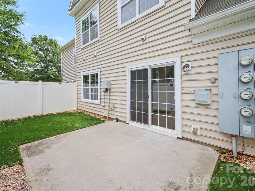 15109 Jade Street, Charlotte, NC 28277.  MLS# CAR4392614, YatesRealty ID 46948. Backyard and patio