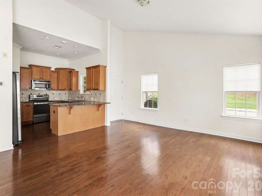 15109 Jade Street, Charlotte, NC 28277.  MLS# CAR4392614, YatesRealty ID 46948. Living and kitchen