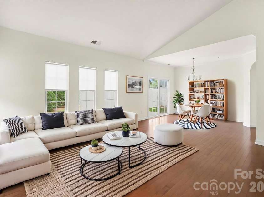 15109 Jade Street, Charlotte, NC 28277.  MLS# CAR4392614, YatesRealty ID 46948. Open living into dining *Virtually Staged*