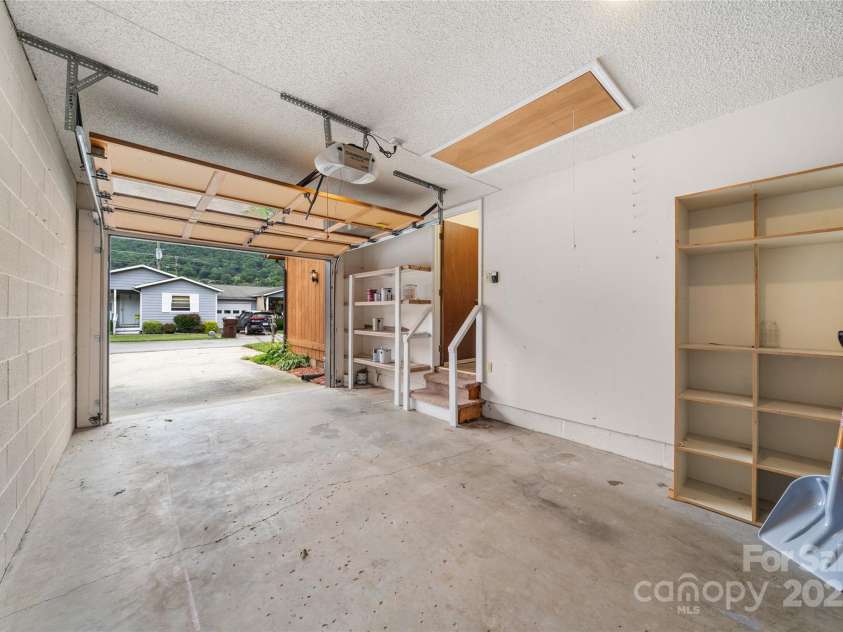 94 Market Street, Maggie Valley, NC 28751.  MLS# CAR4277066, YatesRealty ID 4695. 1-car garage