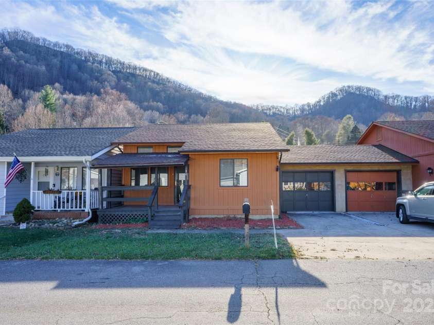 94 Market Street, Maggie Valley, NC 28751.  MLS# CAR4277066, YatesRealty ID 4695. Back yard for pets or gardinging