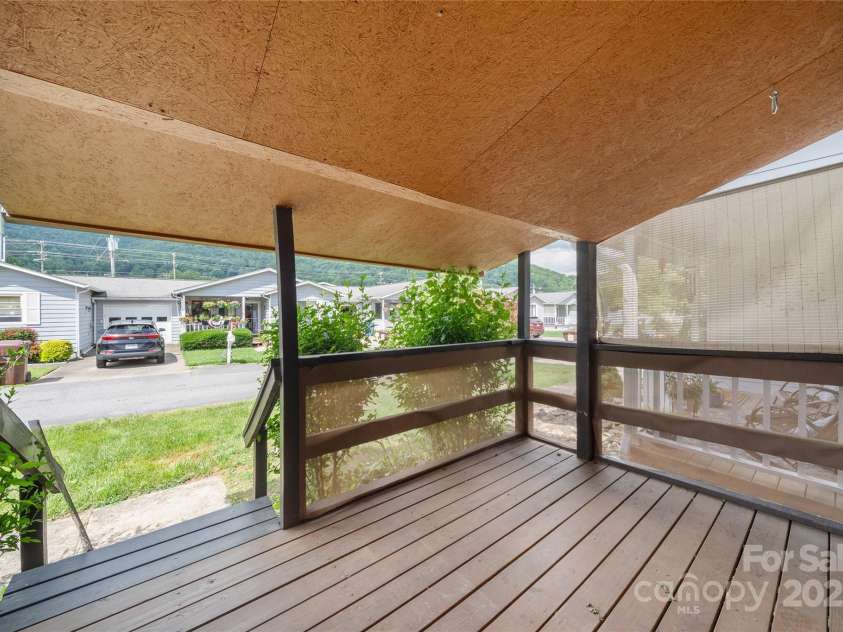 94 Market Street, Maggie Valley, NC 28751.  MLS# CAR4277066, YatesRealty ID 4695. Front entry porch