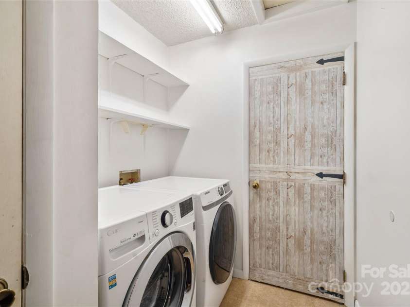 94 Market Street, Maggie Valley, NC 28751.  MLS# CAR4277066, YatesRealty ID 4695. Laundry and mud room from the garage