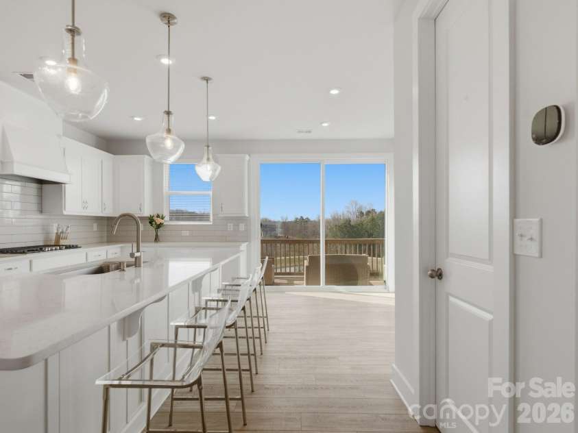 3309 Treble Court, Charlotte, NC 28262.  MLS# CAR4355630, YatesRealty ID 4696. Chef's kitchen w/ expansive island