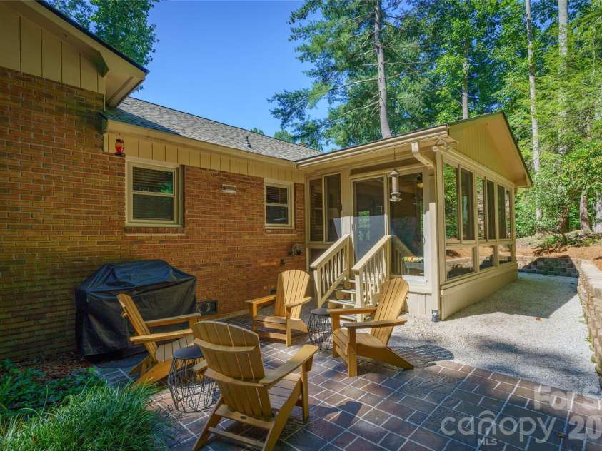 10 Surrey Run, Hendersonville, NC 28791.  MLS# CAR4416552, YatesRealty ID 46971. Back patio