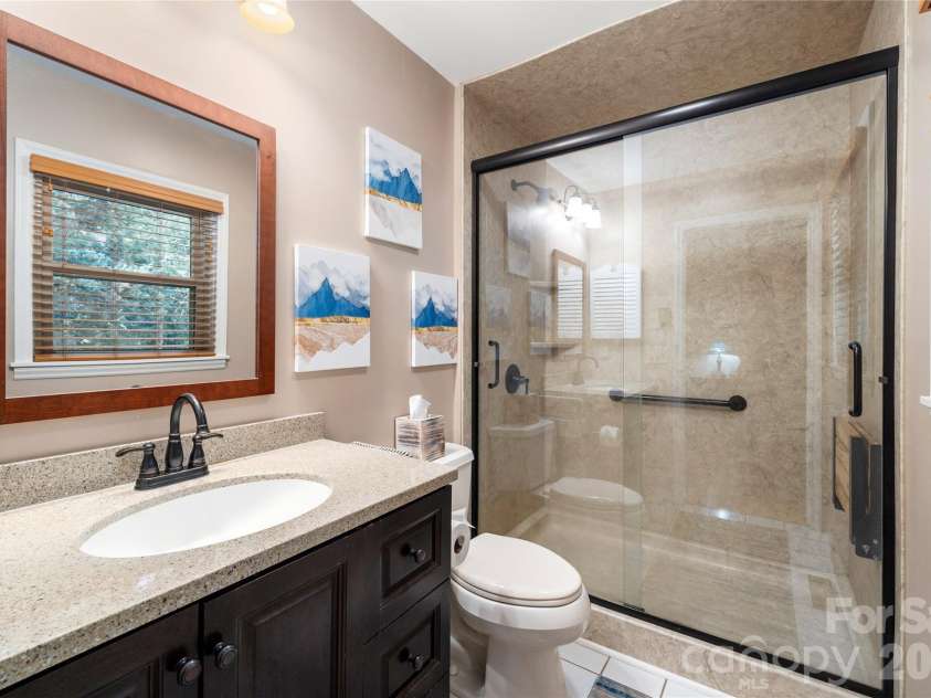 10 Surrey Run, Hendersonville, NC 28791.  MLS# CAR4416552, YatesRealty ID 46971. Primary bathroom
