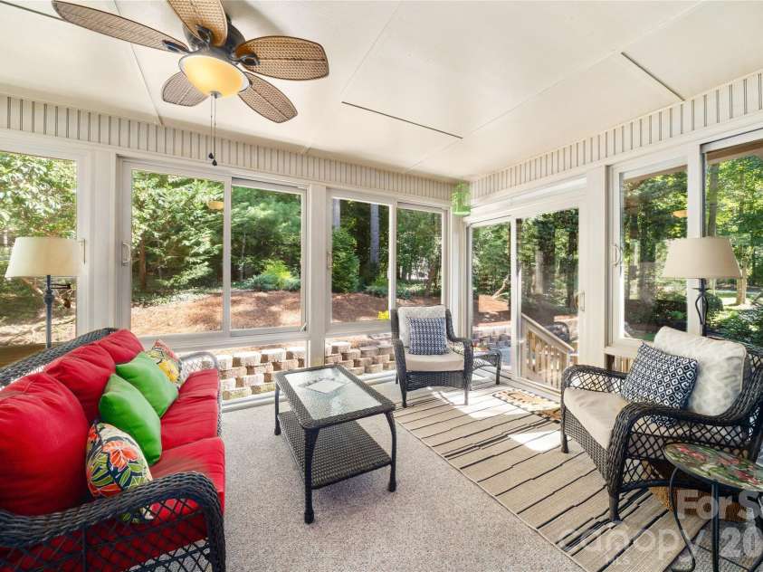 10 Surrey Run, Hendersonville, NC 28791.  MLS# CAR4416552, YatesRealty ID 46971. Sunroom