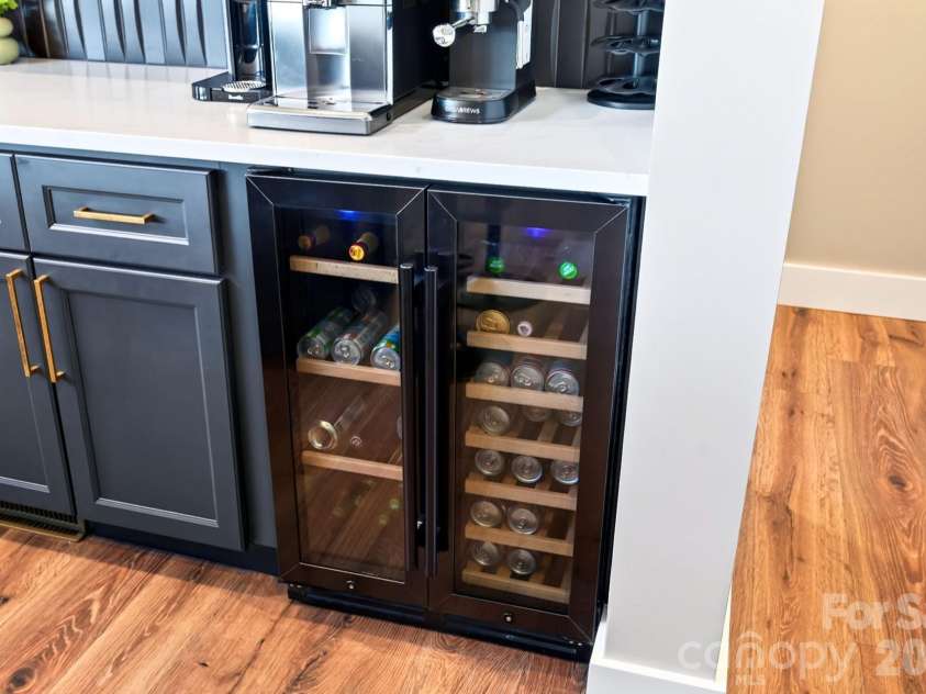 75 Boone Trail, Weaverville, NC 28787.  MLS# CAR4417076, YatesRealty ID 46979. An extra beverage fridge below the coffee station