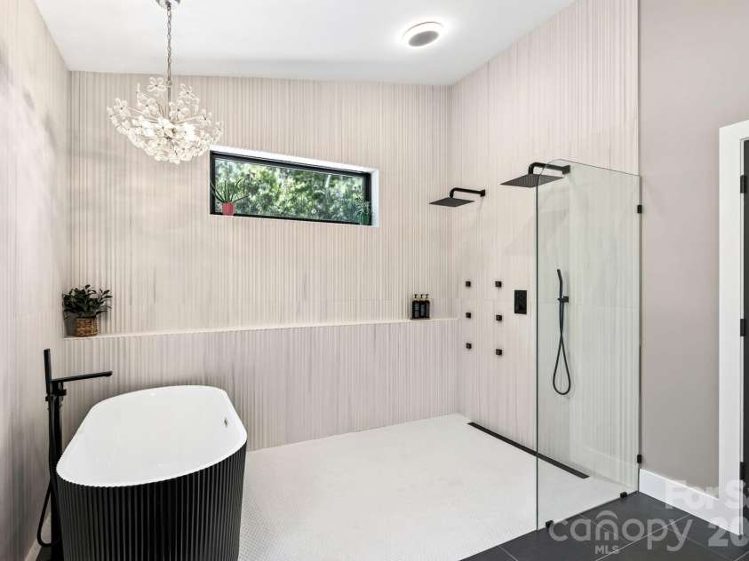 75 Boone Trail, Weaverville, NC 28787.  MLS# CAR4417076, YatesRealty ID 46979. Built-in Bluetooth shower speakers for an elevated everyday experience