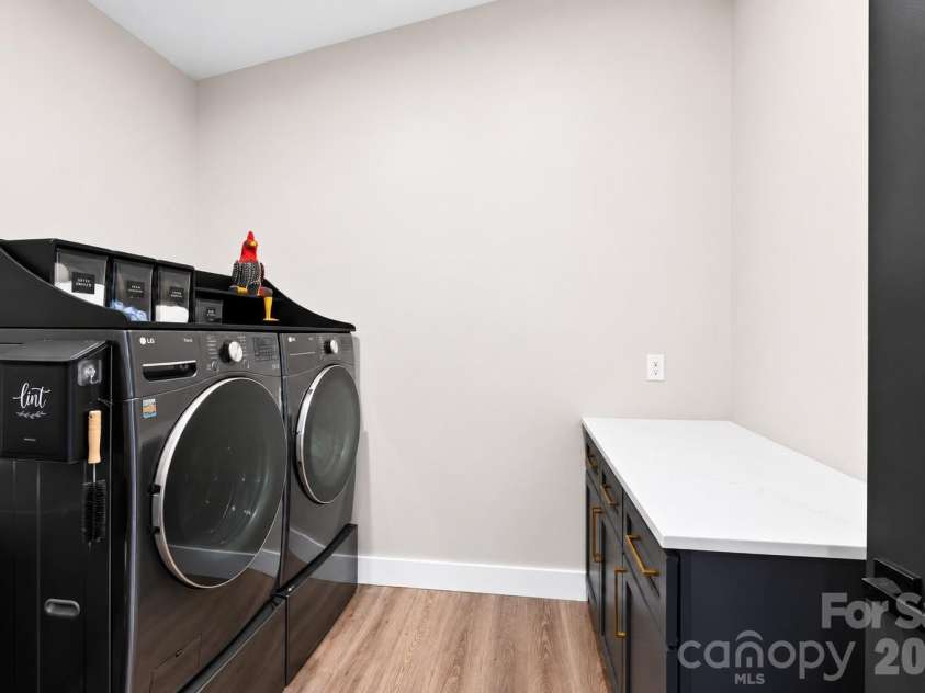 75 Boone Trail, Weaverville, NC 28787.  MLS# CAR4417076, YatesRealty ID 46979. Main level laundry room
